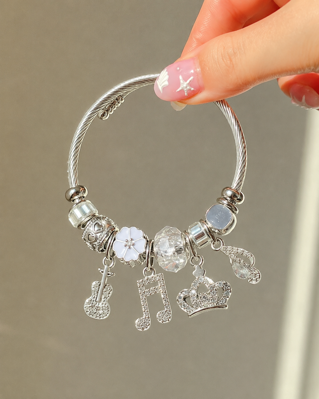 The Tarana Musical Note & Crown Charm bracelet