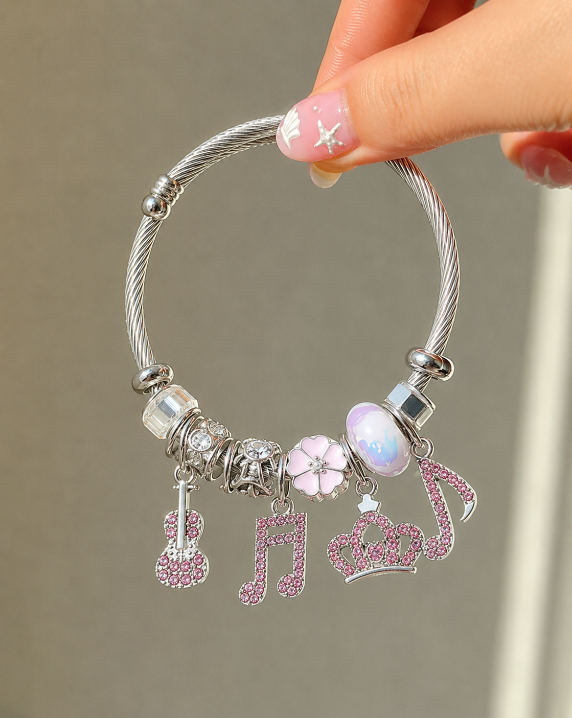 The Tarana Musical Note & Crown Charm bracelet